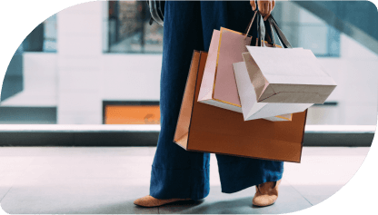 A shopper with shopping bags